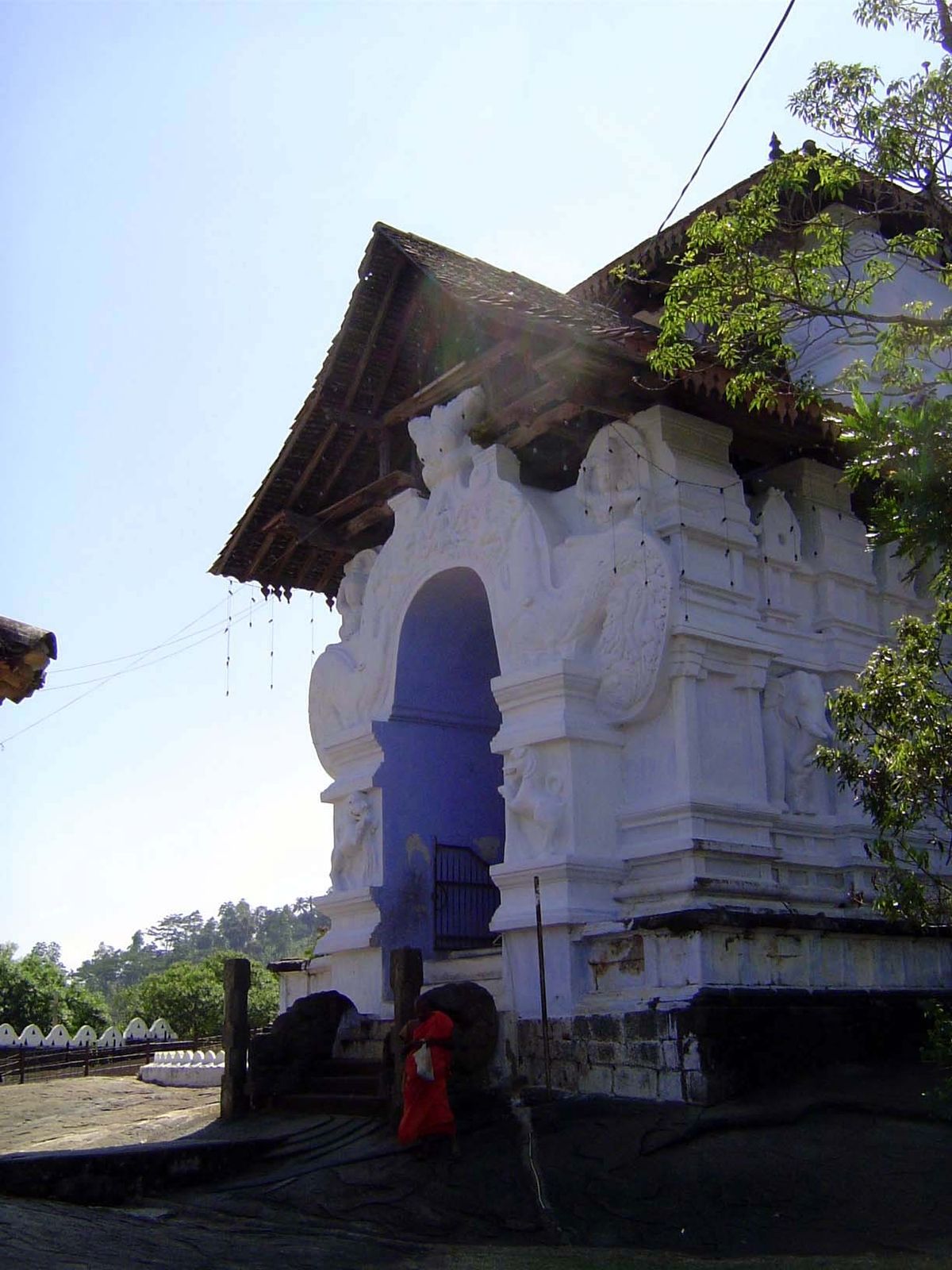 The entrance to the Buddhist temple faces those steps and is trimmed with a makara torana or dragon arch.