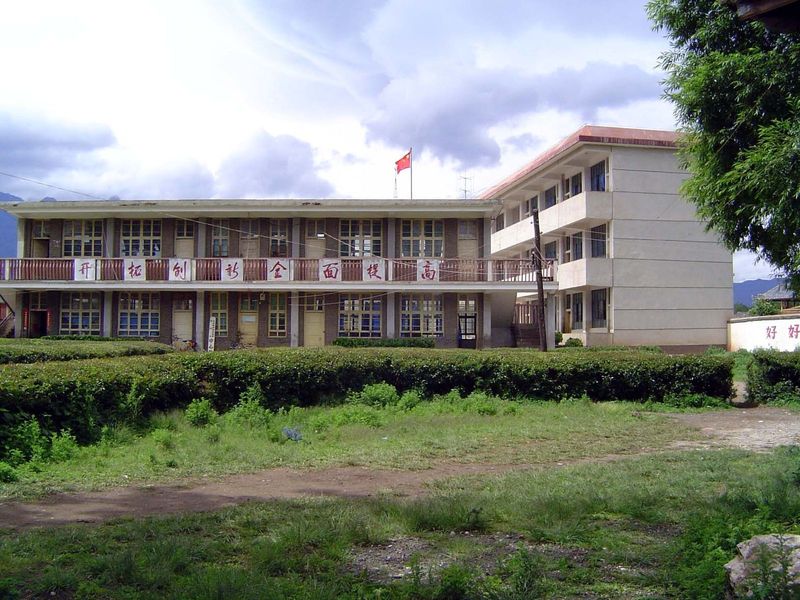 Next door, the school.