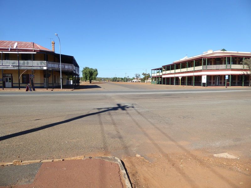 Here's the main intersection in town: straight ahead and off to the right a bit, there's an abandoned railway station. Hard to imagine 15,00
