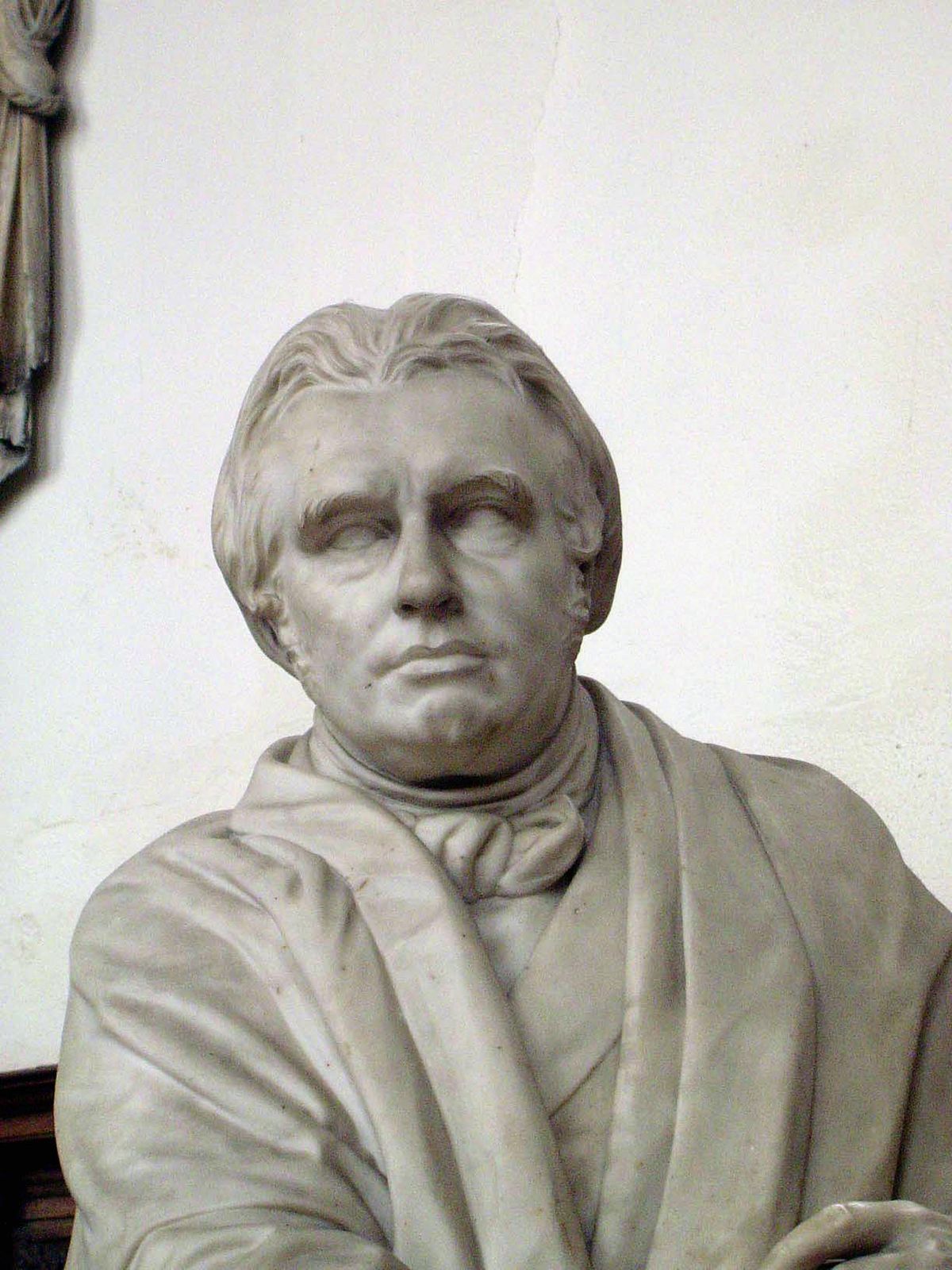 Apart from his admiration of Bacon, Macauley was instrumental in anglicizing India, which helps explain why the statue is by Thomas Woolner,