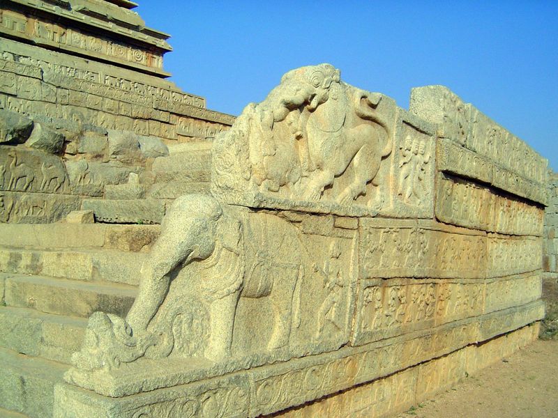 A stairway, with an elephant and mythologized lion.