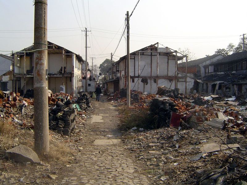 The same neighborhood, apparently in a state of turnover.