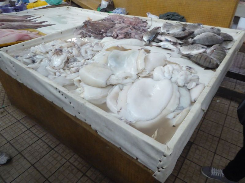 It's a legit market, selling squid now as it did a century ago.