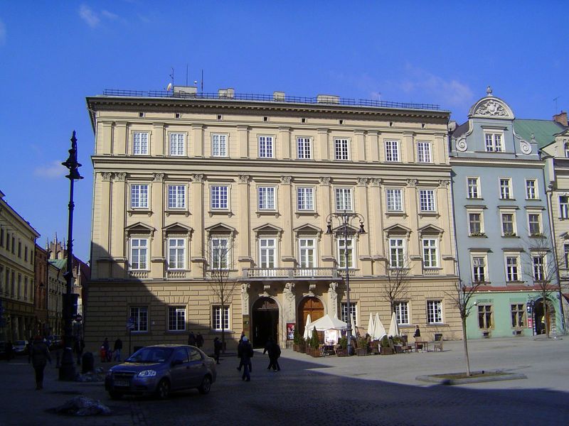 At the south end of the west side, the Potocki family's palace is known as the Palace Under the Rams from the balcony supports. More recentl