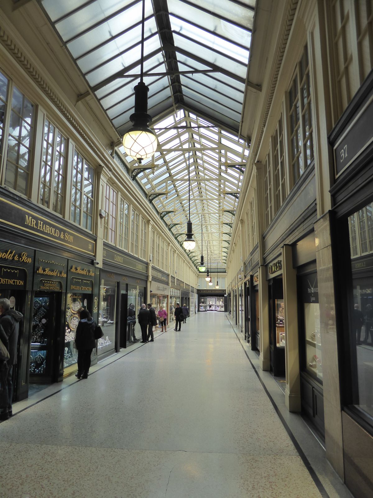 Here's something else that's unusual. It's the L-shaped Argyle Arcade, Scotland's first indoor shopping mall. It was cut through older resid