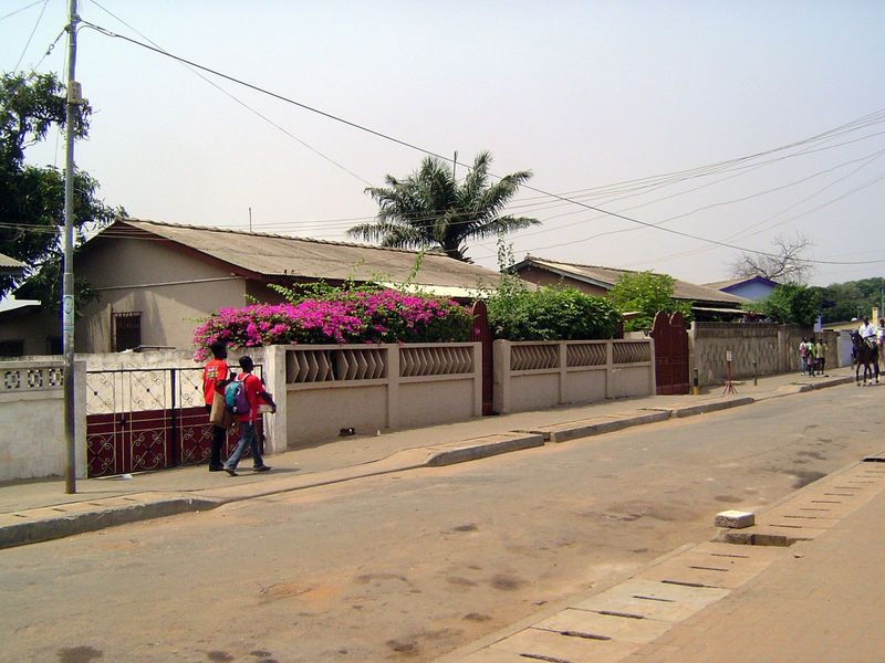 Before you jump the wall, remember that Bougainvillea has nasty thorns. But the streets are clean, well-paved, and drained.