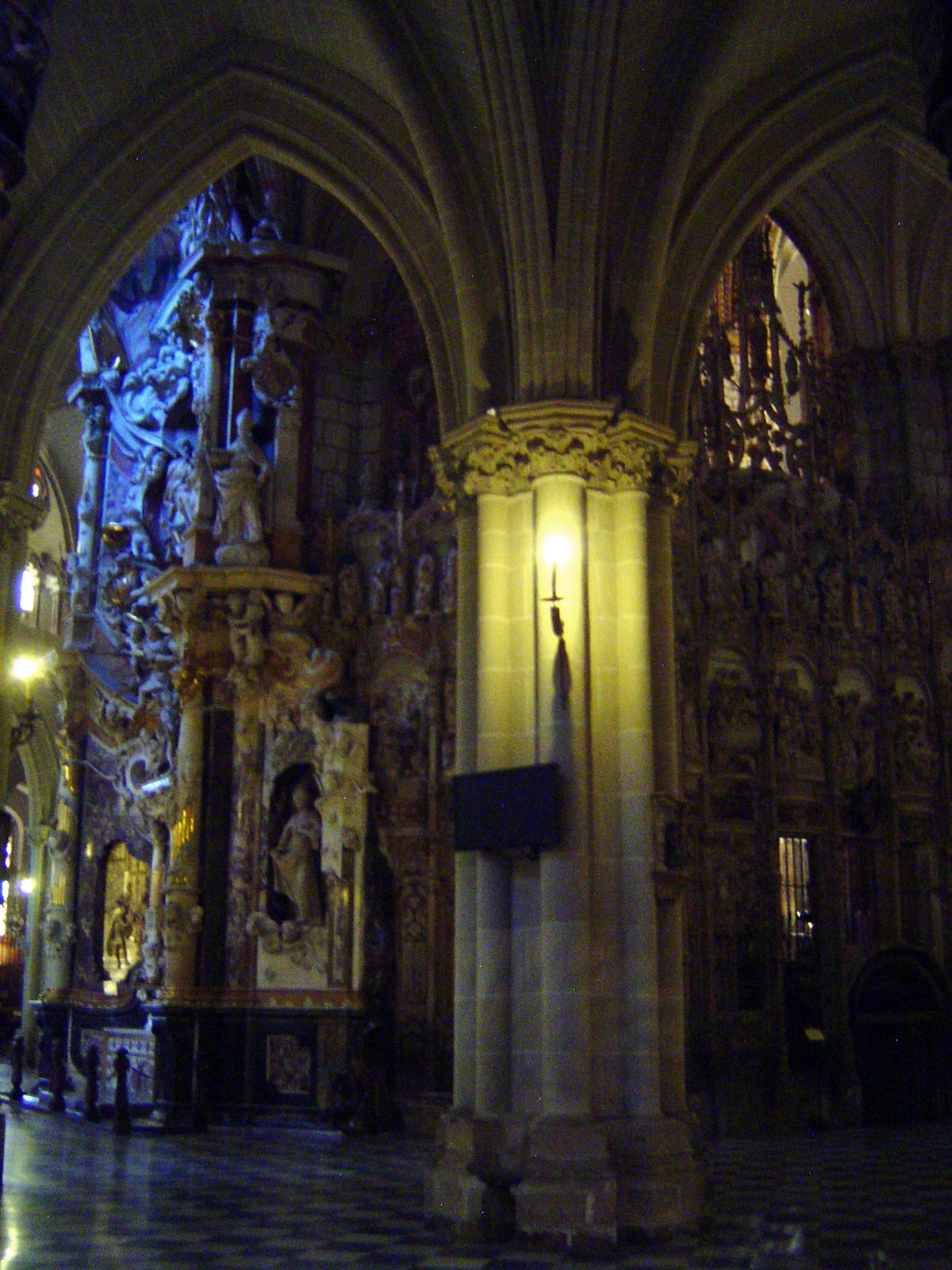 The most peculiar feature of the cathedral, the Transparente, is glimpsed on the left here, behind the altarpiece and chancel wall.