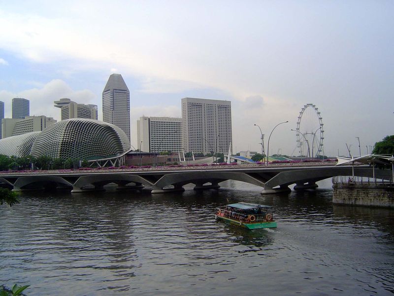 The new Esplanade Bridge at the mouth of the river, with the Esplanade Theaters at the left.