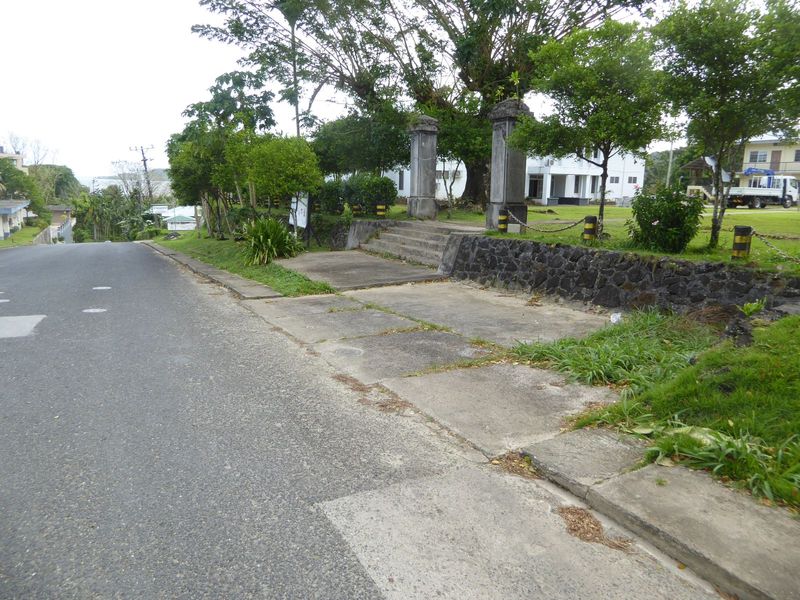 On an intermediate street, the Japanese built a school. Here's the entrance, with the school behind. The building is used today as the Kolon