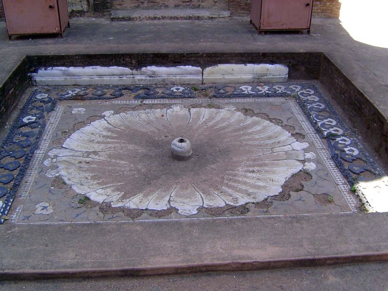 A marble-inlaid fountain.