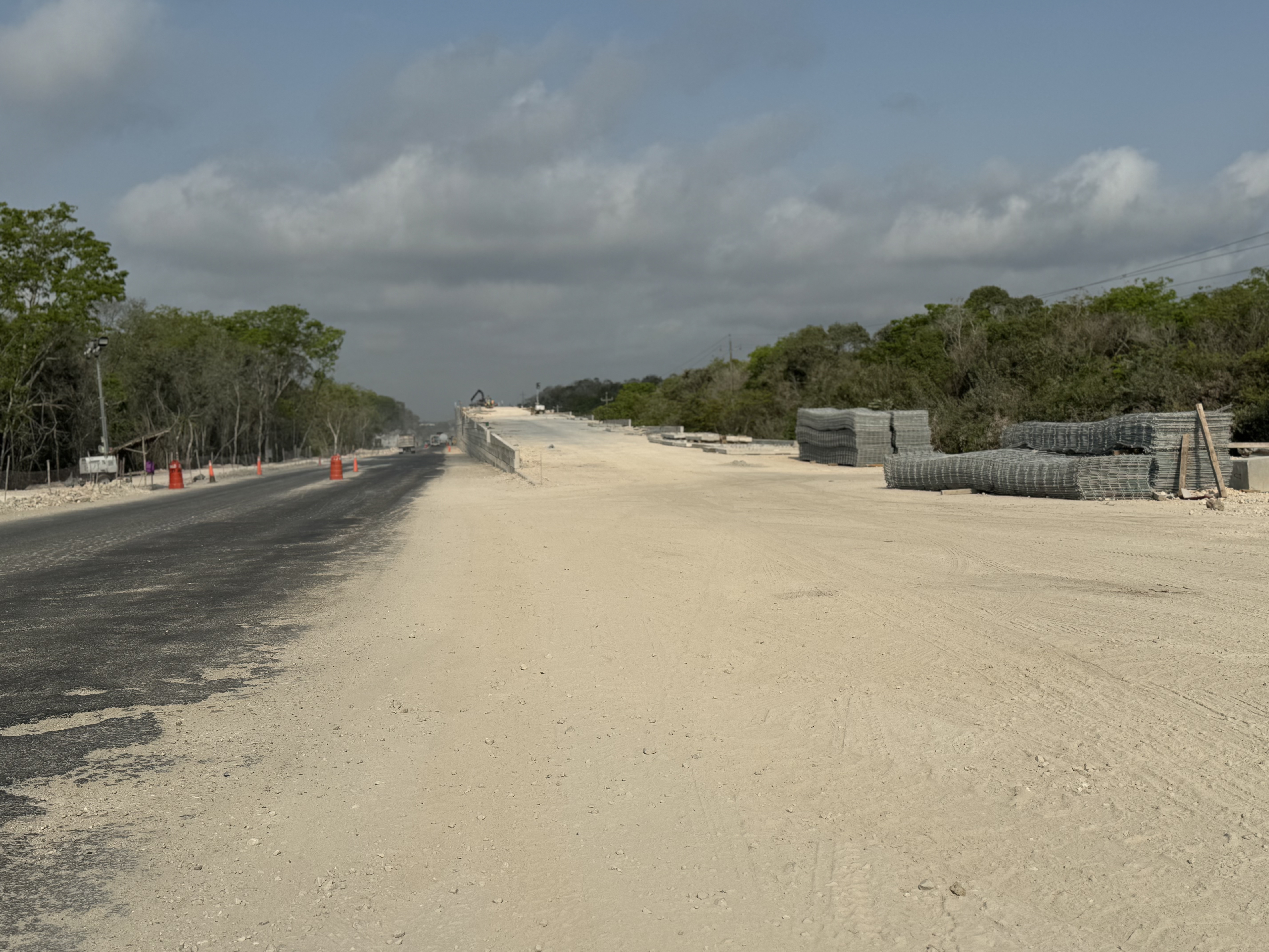 Fat chance.  The rail line here largely parallels the Transpeninsular Highway Route 186, running west from Chetumal.  The highway was unpave