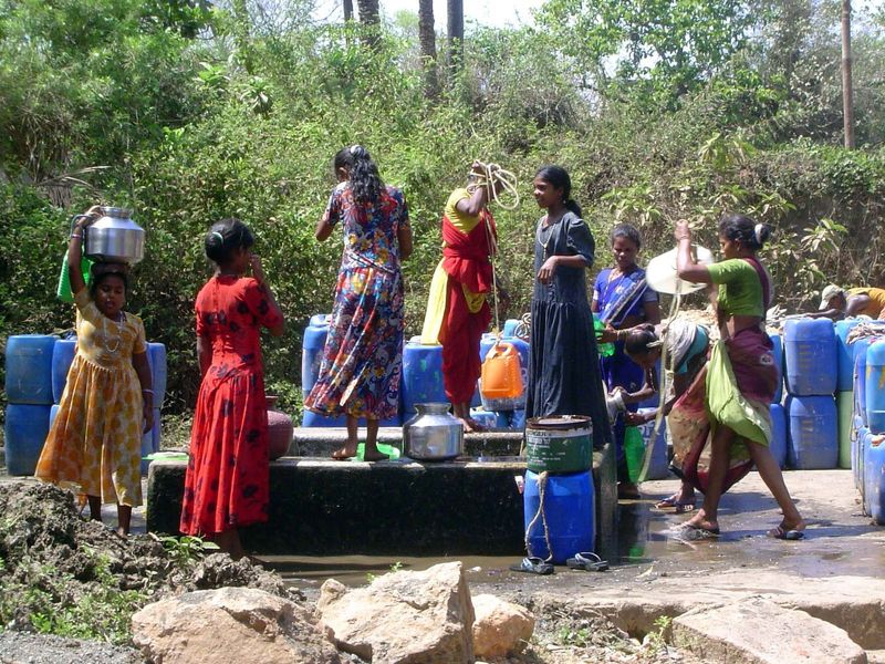 Villagers enter the fort to use the old wells.