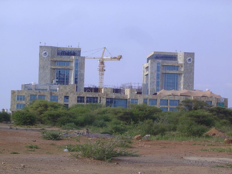 Yet another mixed-use project rising from the scrub.