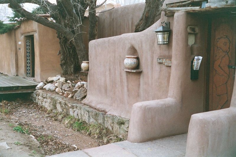 Entering these houses means stepping over the acequia madre.