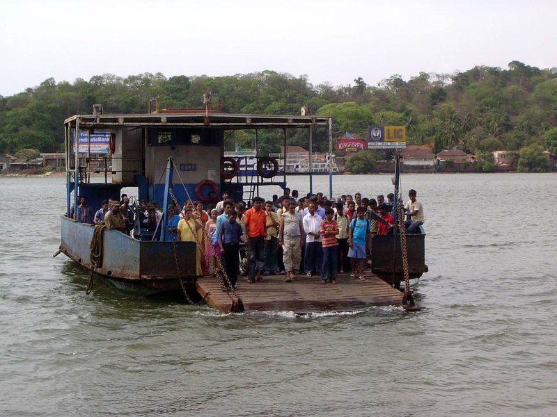 Despite the new bridge across the Mandovi, old ferries stay busy.