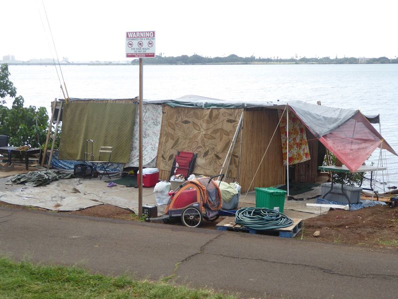 Can't afford any of this? Neither can the people camping out at Blaisdell Park on the shores of Pearl Harbor.