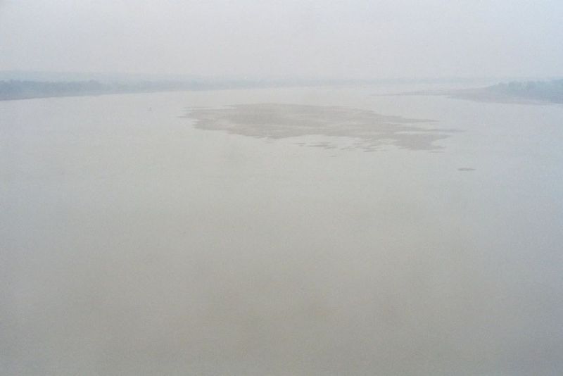 The view from the hill and looking northeast and downstream, toward Varanasi. This is the point where the Ganges makes it great northerly tu