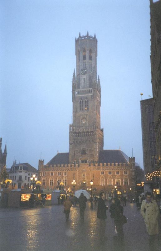On one side of the Grande Place, or Markt, is a former cloth market, Les Halles, with the city's iconic belfry. It's ungainly, "an unnatural