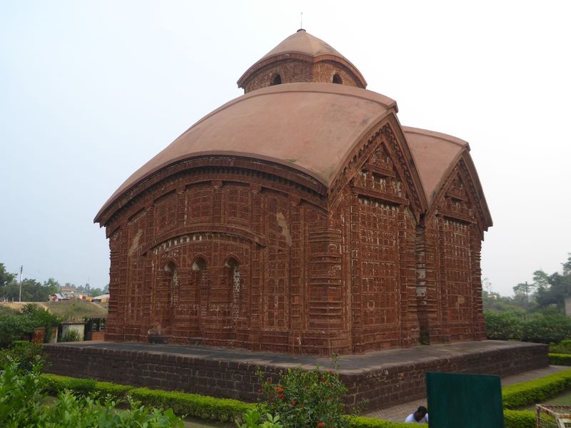 The temple is often called the Kestorai or Keshta Rai Jor Bangla and can be classified as a pair of do-chala or two-thatched huts supporting