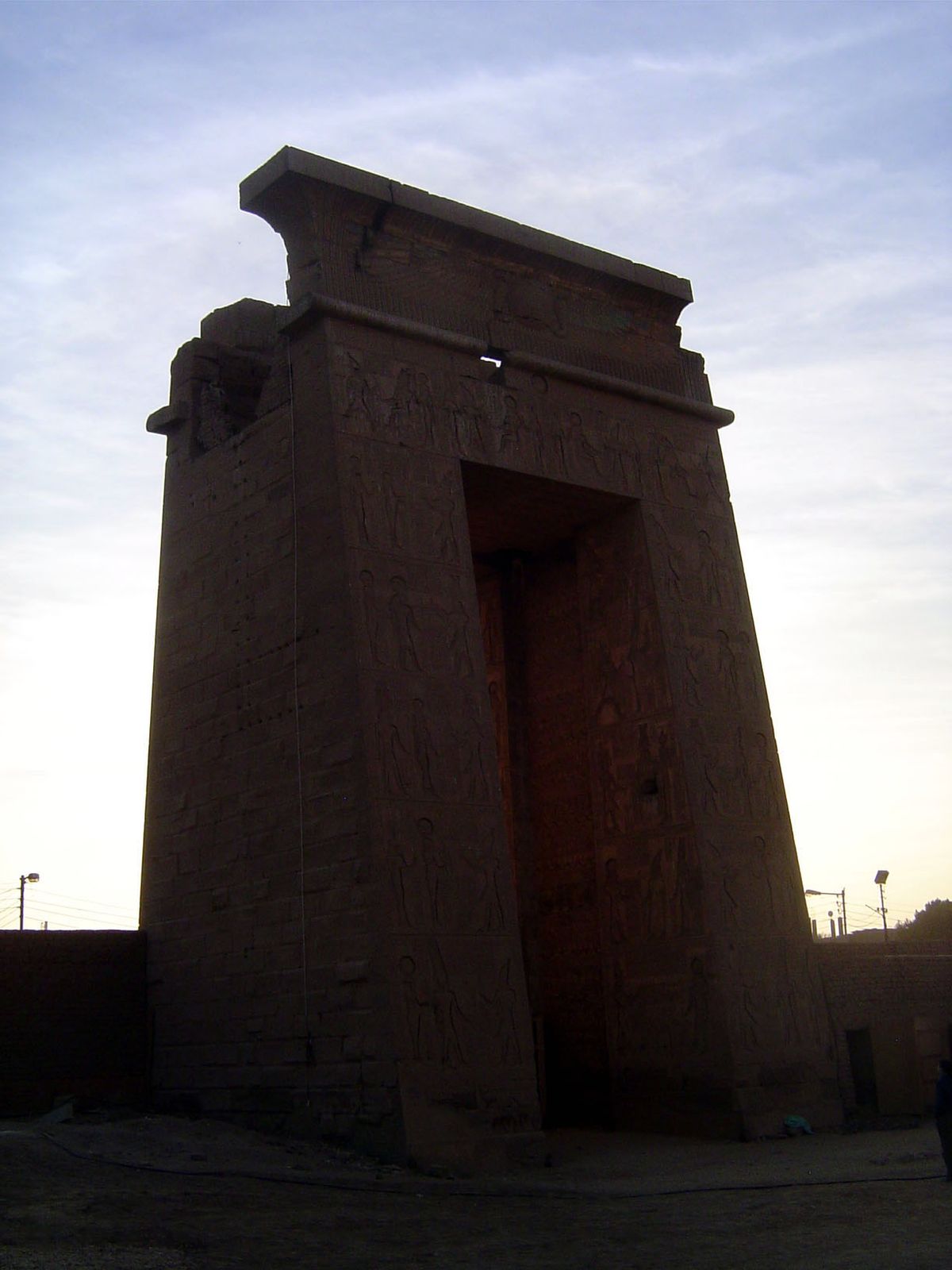 South of the hall is this gate in the wall of the central enclosure. It's called the gate of Ptolemy III Euergetes or the Bab el-Amara. An a