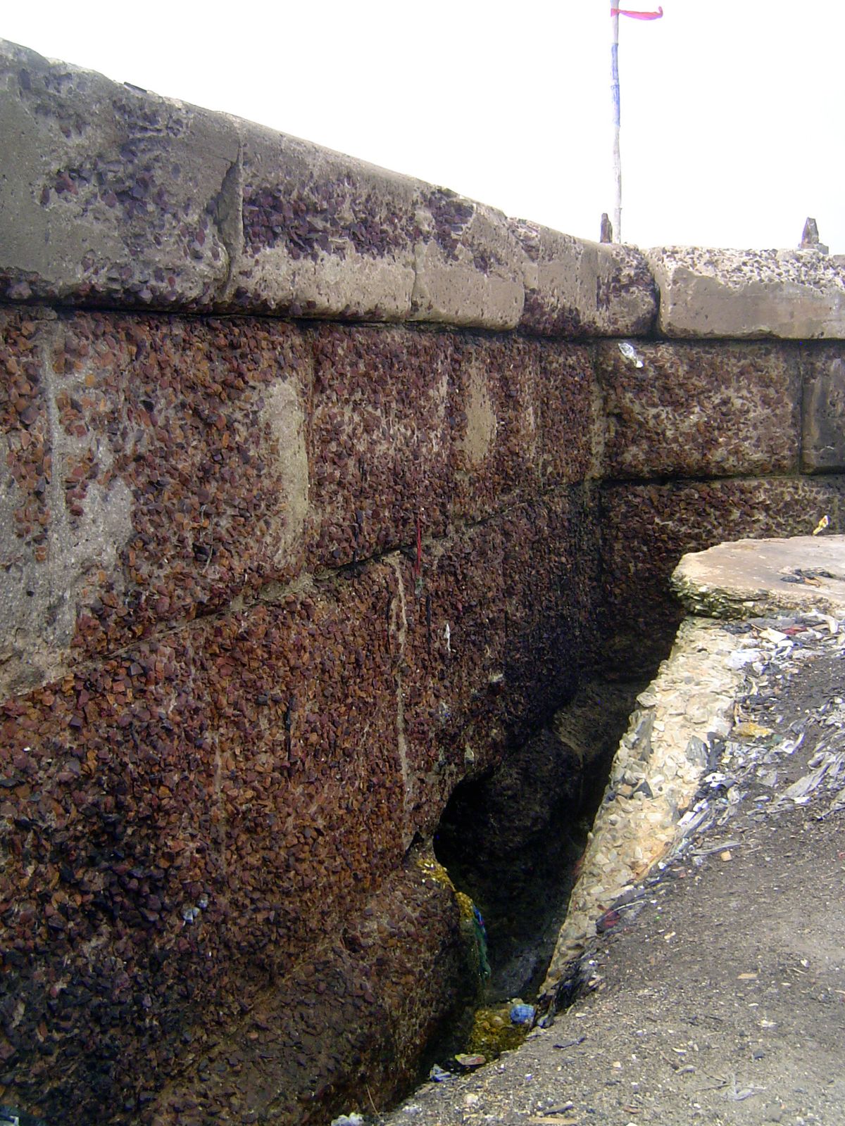A tunnel under the breakwater.