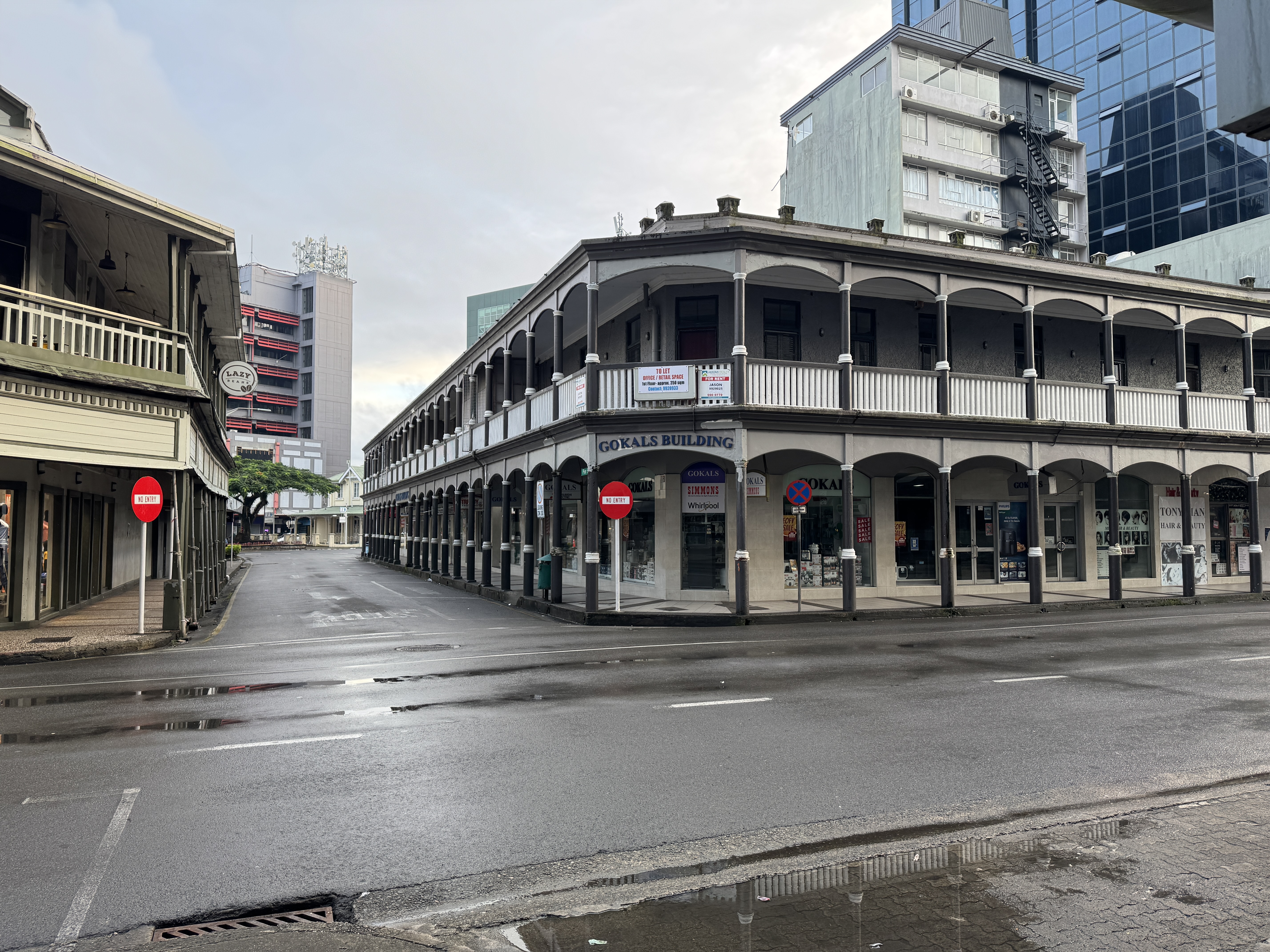 Instead of being demolished, the building now houses an electronics store downstairs and offices above.