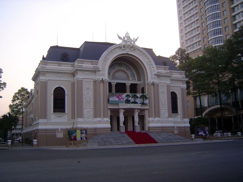 The Municipal Theater, 1898, restored 1995. To its right, the Hotel Caravelle.