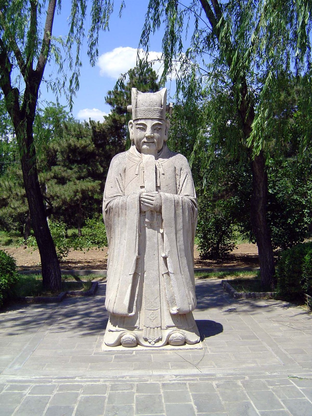Opposite it, a civilian official. All the figures are standing, because sitting in the imperial presence was forbidden.