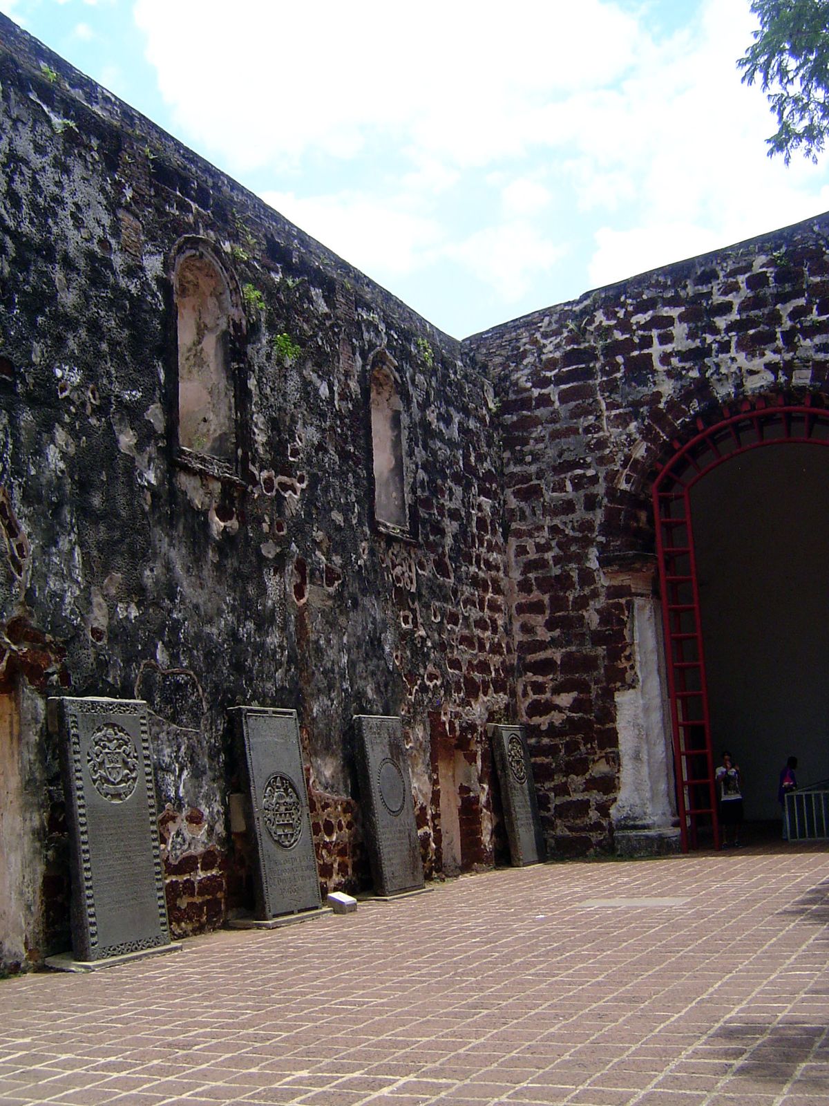 Dutch tombstones survive in the church.