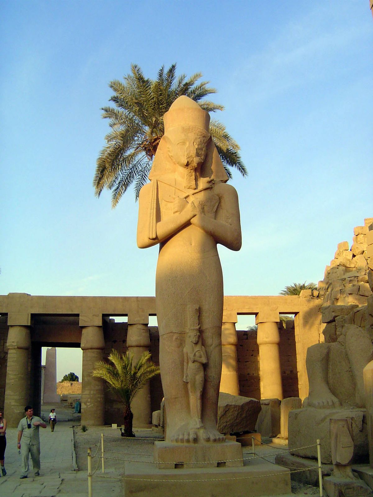 This statue of Ramses II, with his daughter Princess Bint-anta at his feet, stands before the second pylon. It's been moved here; only the f