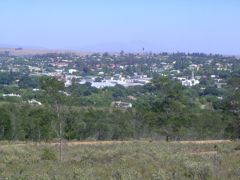 Here we are on the east side of town. A bit of land like this in the foreground is an invitation to a developer.