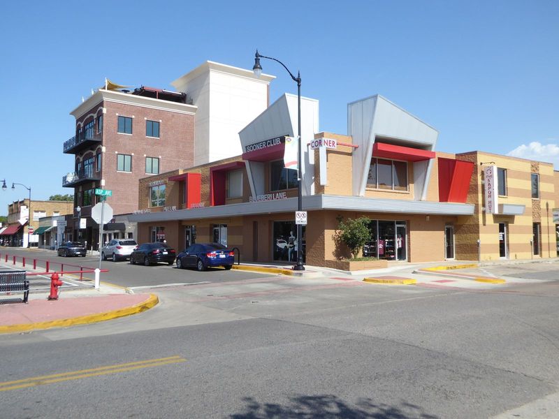 A neighbor, built in 1968, got into the act with useless but oh-so-stylish protrusions.

For more on campus corner, see Amber Sarmiento, "Ur