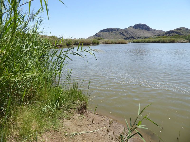 A river-blocking ridge permits a dam and this small reservoir.