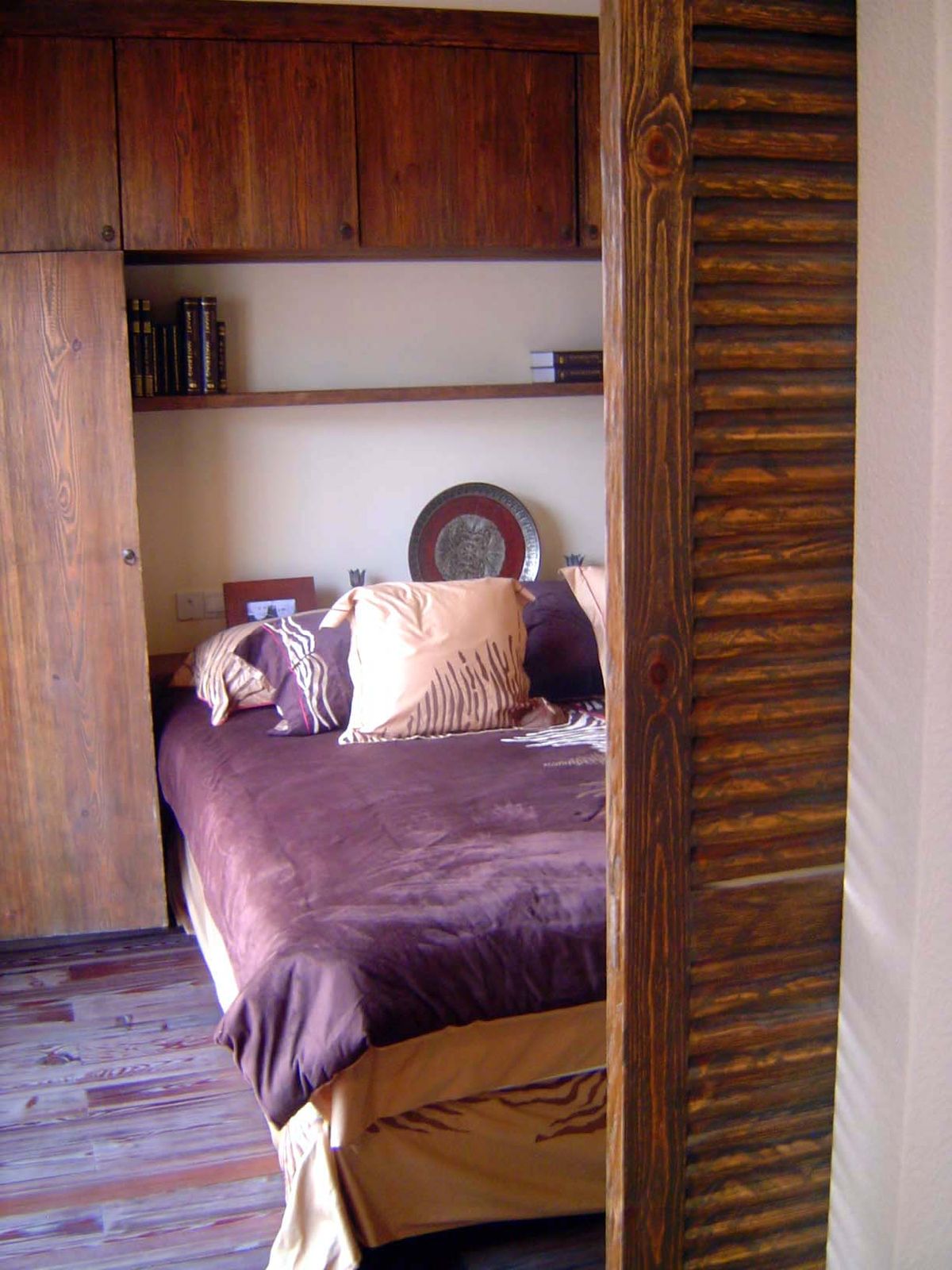 Bedroom fronting sunken patio.
