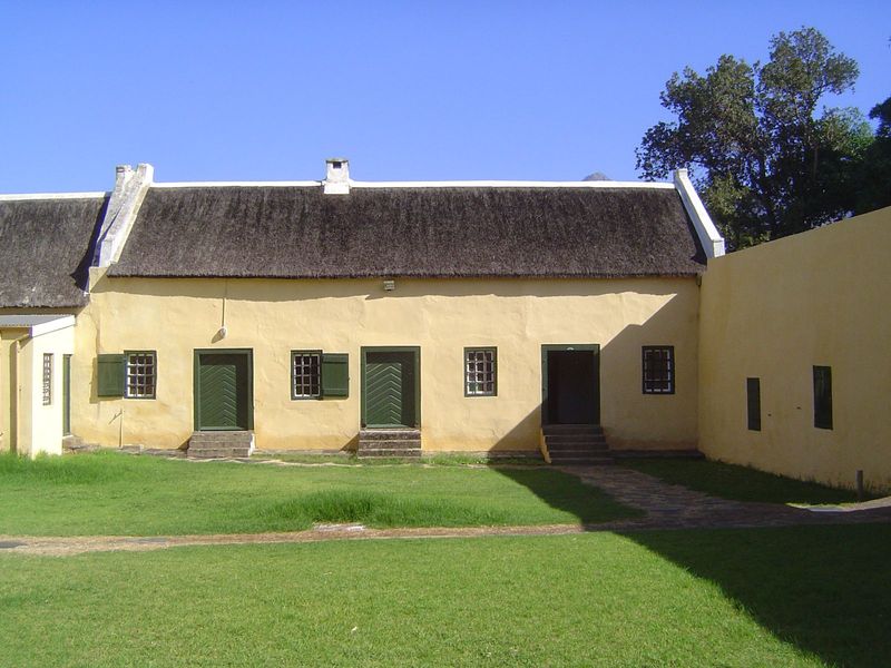 There's a courtyard behind with in the shaded doorway a pitch-black cell for recalcitrant prisoners. Apparently it was used for non-complian