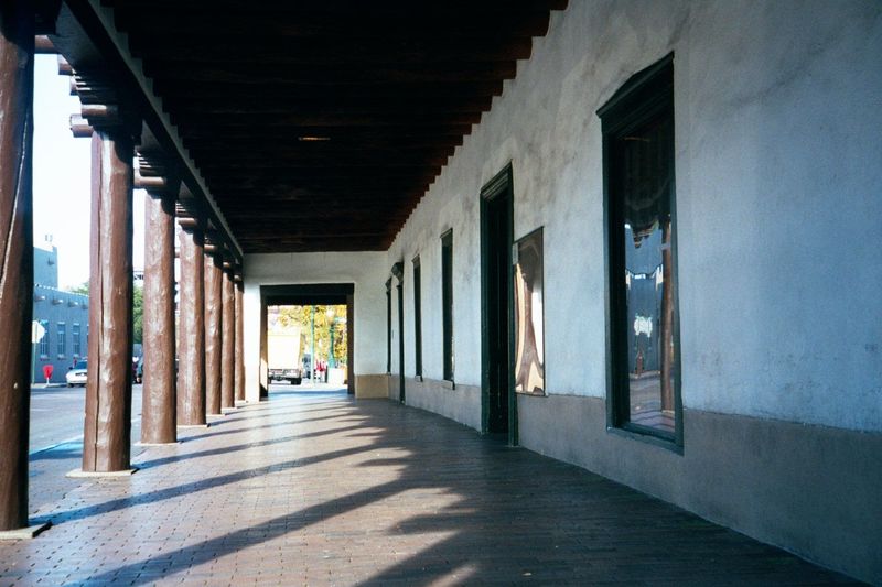 We're on the approximately north side of the plaza and looking at the portal of the palacio real 1610, or royal palace, now known as the Pal