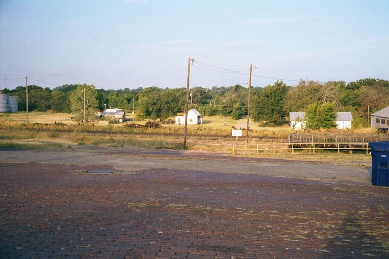 Down by the railroad station. The old brick pavers lead uphill, behind the camera, toward the town.