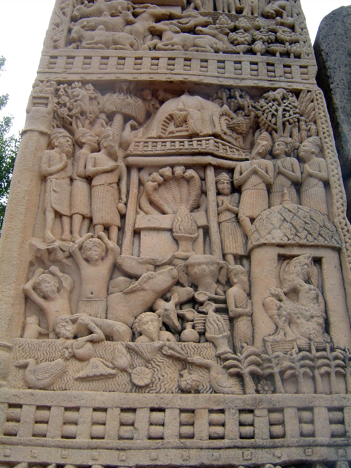 The front face of the south pillar of the east gate shows the conversion of the Kasyapas, Brahmans whose temple had a fearsome fire-breathin