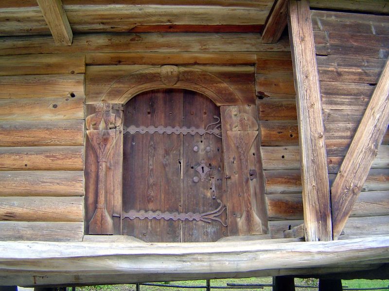 The doorway, massive yet tender.