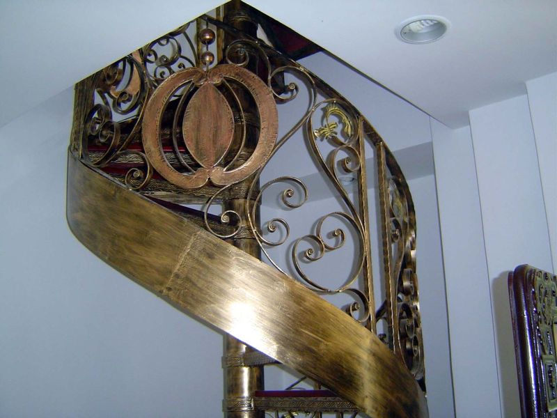 Inside, a very stylish circular staircase.
