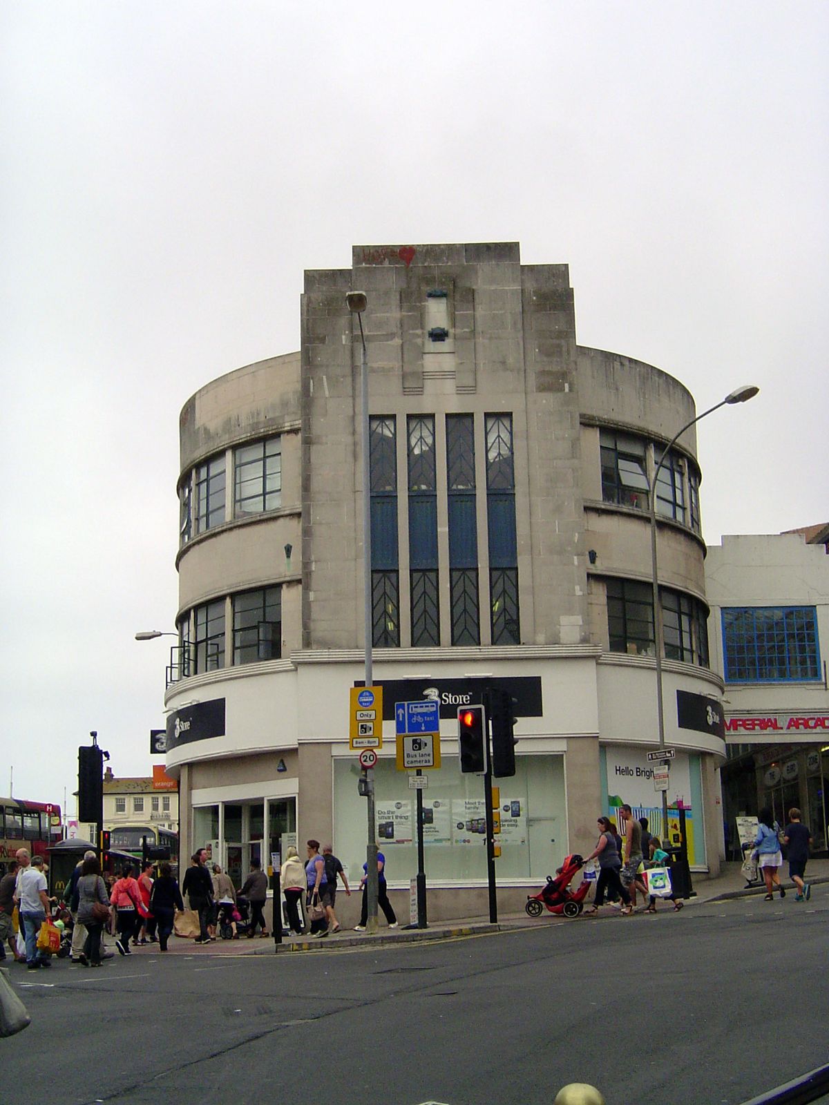 In time classicism would yield to other styles, including Art Deco, represented here at the corner of Dyke and Western by a building added i