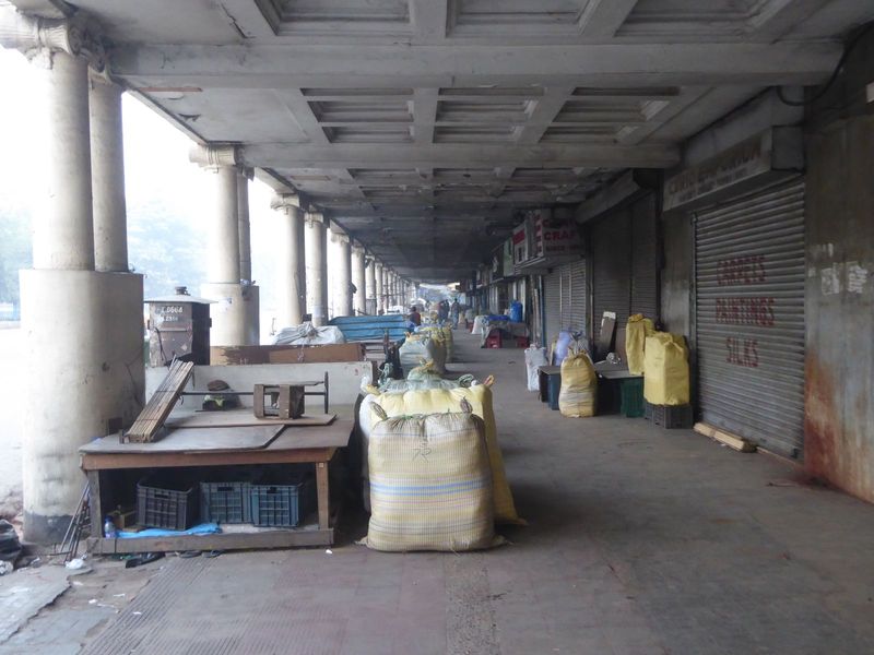 It will soon be mobbed. Right now, the goods are still bagged up. They just arrived by handcart.