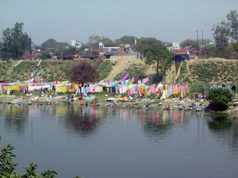 The river below is used as a laundry.