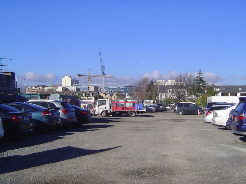 Meanwhile work continues, as indicated by the tower cranes and the parking for construction workers. Some 80 percent of the CBD had been cle