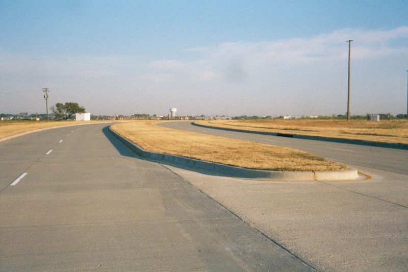 This is the fabled "serpentine road" that meanders through the former naval-air station. Why serpentine? Could it be a tribute to Louis Sull