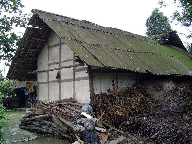 It leads to a farm house, fuelwood stacked all around.