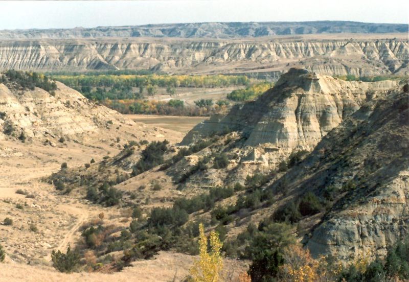 Soft material carved by erosion in a country so dry that vegetation can't take hold enough to stabilize the surface. That's the definition o