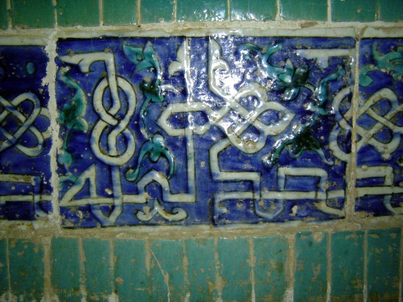 Glazed tiles from the wall panels of the funerary chamber.