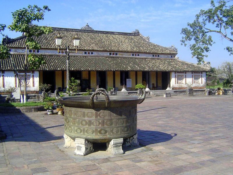 North of the Hall of Supreme Harmony, a courtyard is flanked right and left by identical buildings, the Halls of the Mandarins. The cauldron