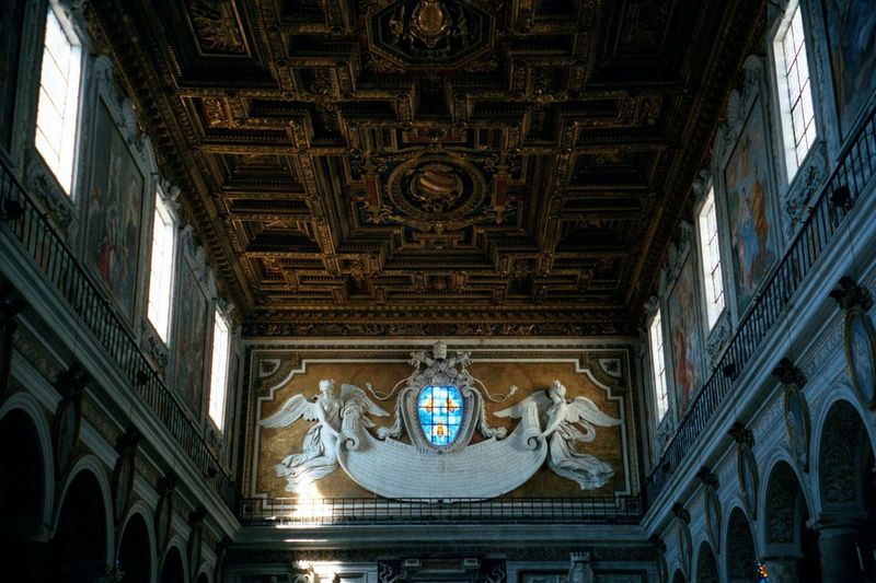 Rome has several of these basilica-style churches. Even when decorated with rococo flourishes, they are still restrained in comparison with 